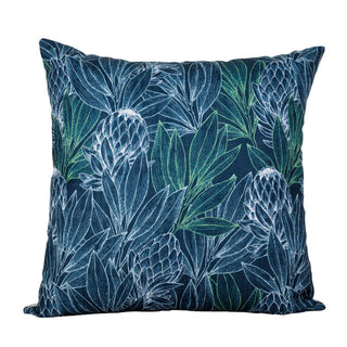 Scatter cushion with teal protea botanical pattern