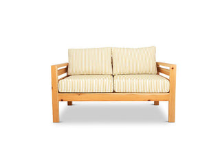 Classic outdoor two seater cedarwood couch with mustard & white striped canvas cushions