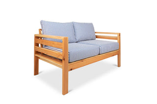 Classic outdoor two seater cedarwood couch with navy & white striped canvas cushions