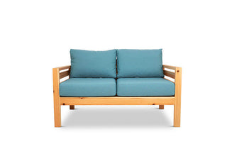 Classic outdoor two seater cedarwood couch with turquoise canvas cushions