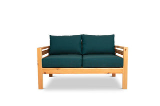 Classic outdoor two seater cedarwood couch with green canvas cushions