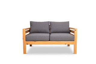 Classic outdoor two seater cedarwood couch with grey canvas cushions